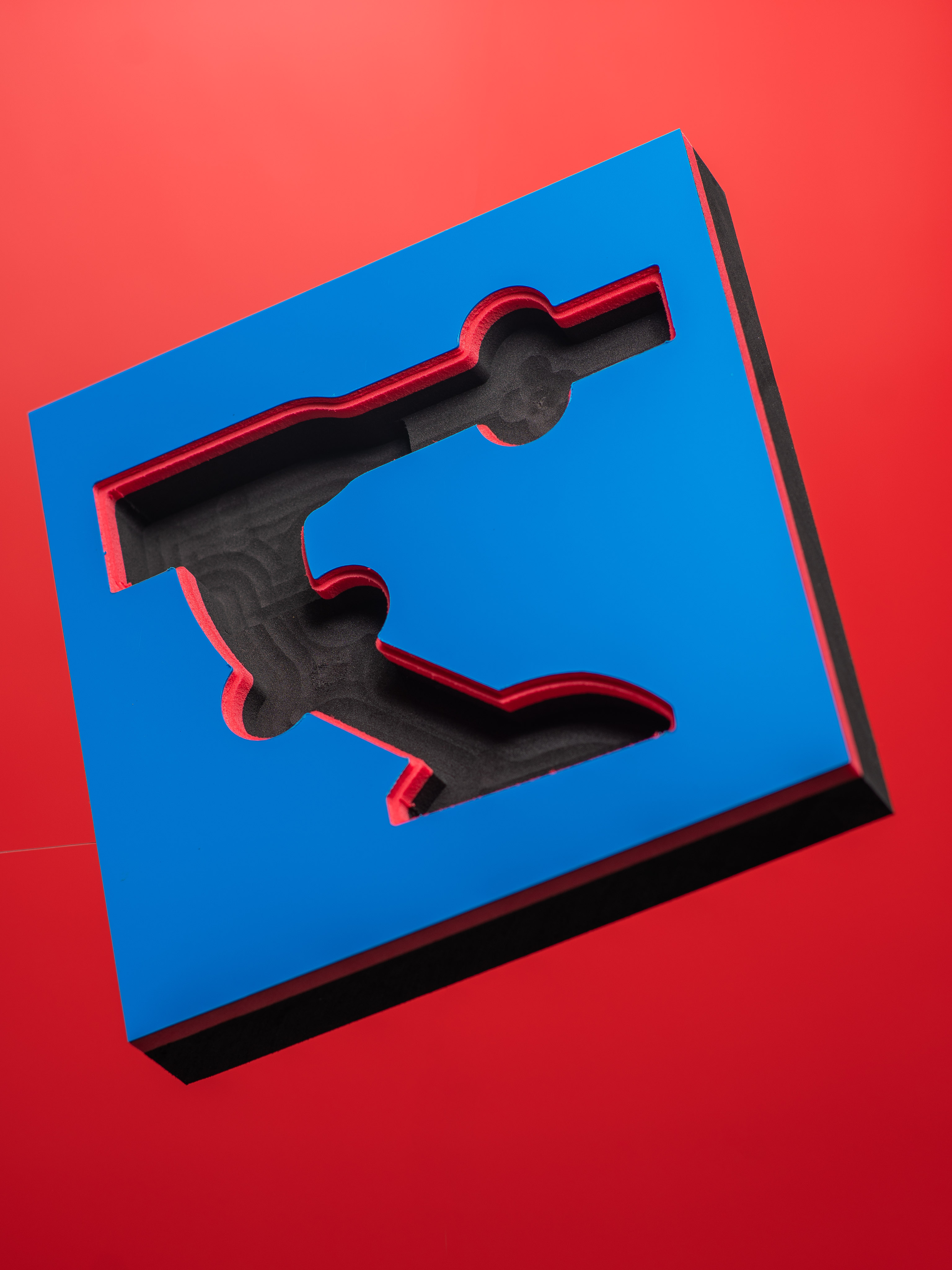 Red custom CNC foam insert for cameras and electronics